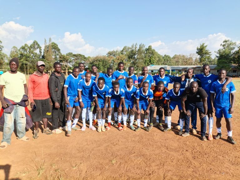 NET football team squad photo in blue kit